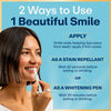 Teeth whitening pen usage with woman applying the pen near her teeth
